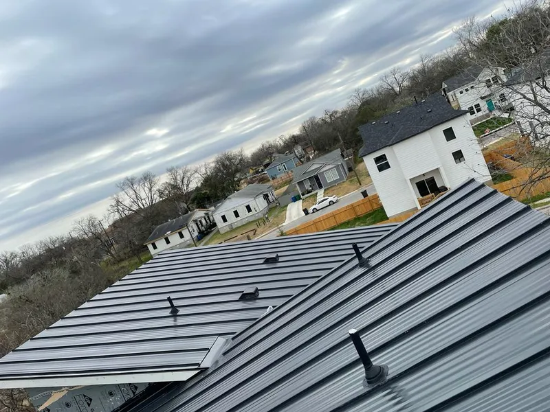 Standing seam metal roof panels with vents for Skylight Repair in Edgemoor